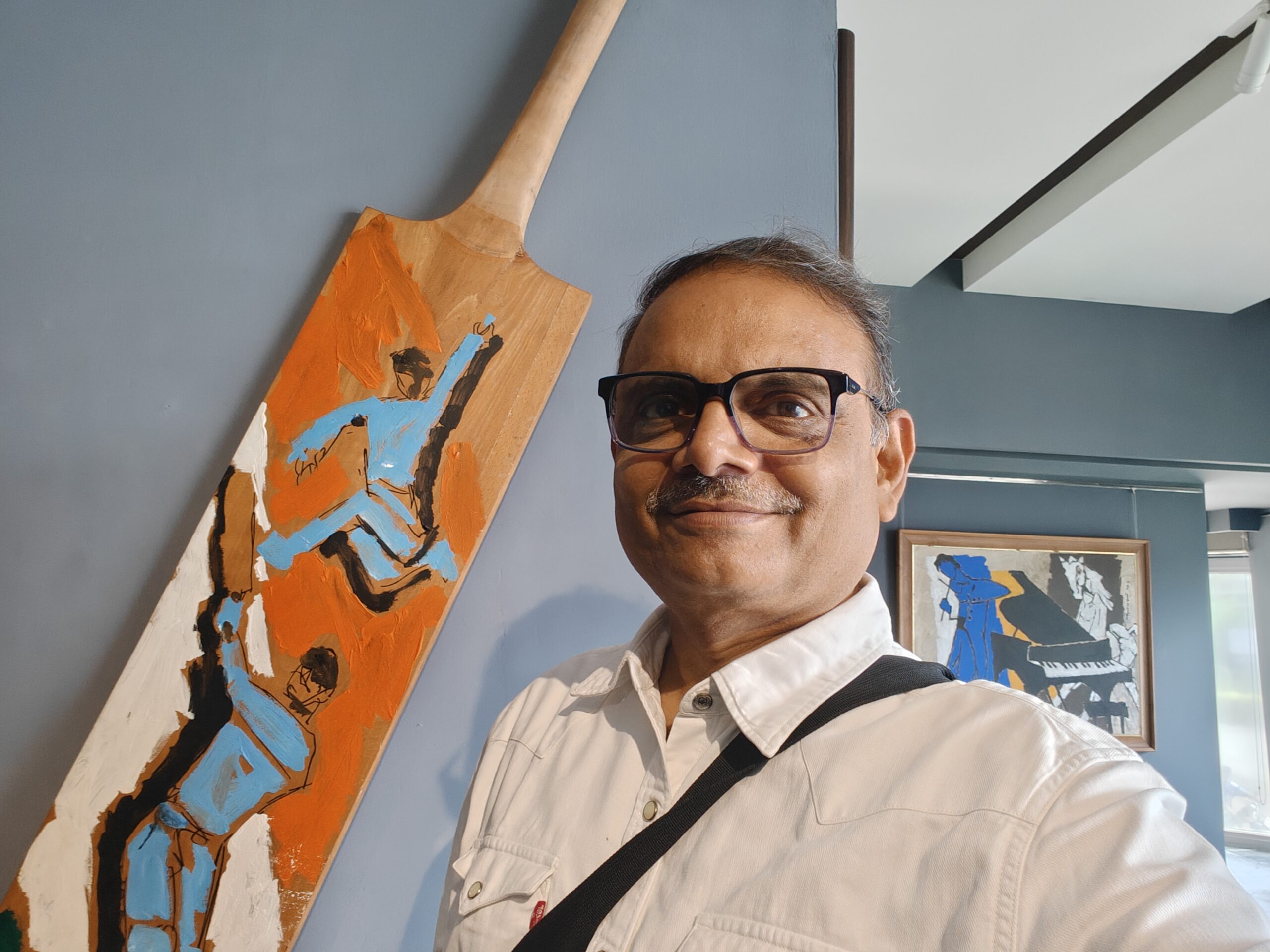Sanjay Verma with a Bat painted by M F Hussain